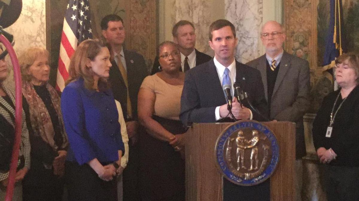 Attorney General Andy Beshear and first lady Glenna Bevin unveil statewide training programs to fight child abuse.