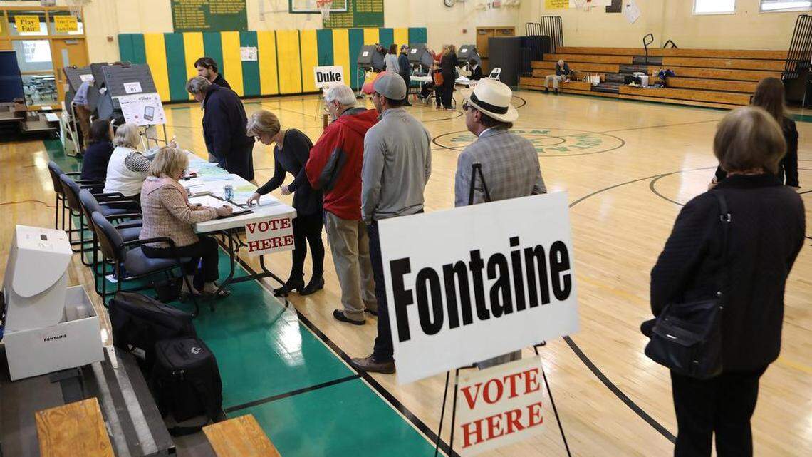 Voters waited in line at the Fontaine precinct before casting ballots in the 2016 general election at Morton Middle School.