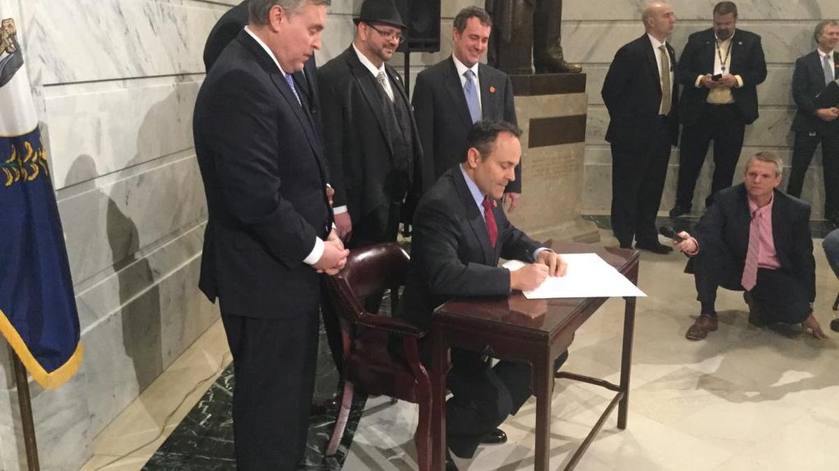 Gov. Matt Bevin signs an executive order to give felons a “fair chance” in applying for state jobs.