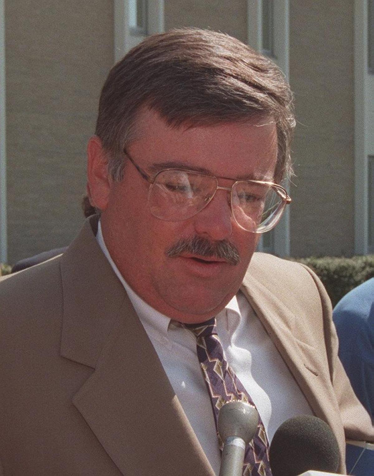 Kent Downey, a Kentucky House aide, pleaded guilty to using his state office to promote gambling and prostitution.