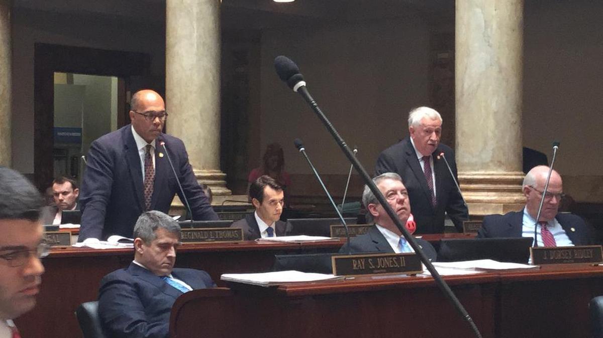 Sen. Reginald Thomas, D-Lexington, left, and Sen. Albert Robinson, R-London, debated a bill that would let businesses reject gay customers on religious grounds.
