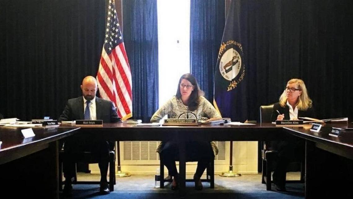 From left, then-Assistant to the Director Matthew Selph, Secretary of State Alison Lundergan Grimes and then-Executive Director Maryellen Allen at a meeting of the Kentucky State Board of Elections in Frankfort.