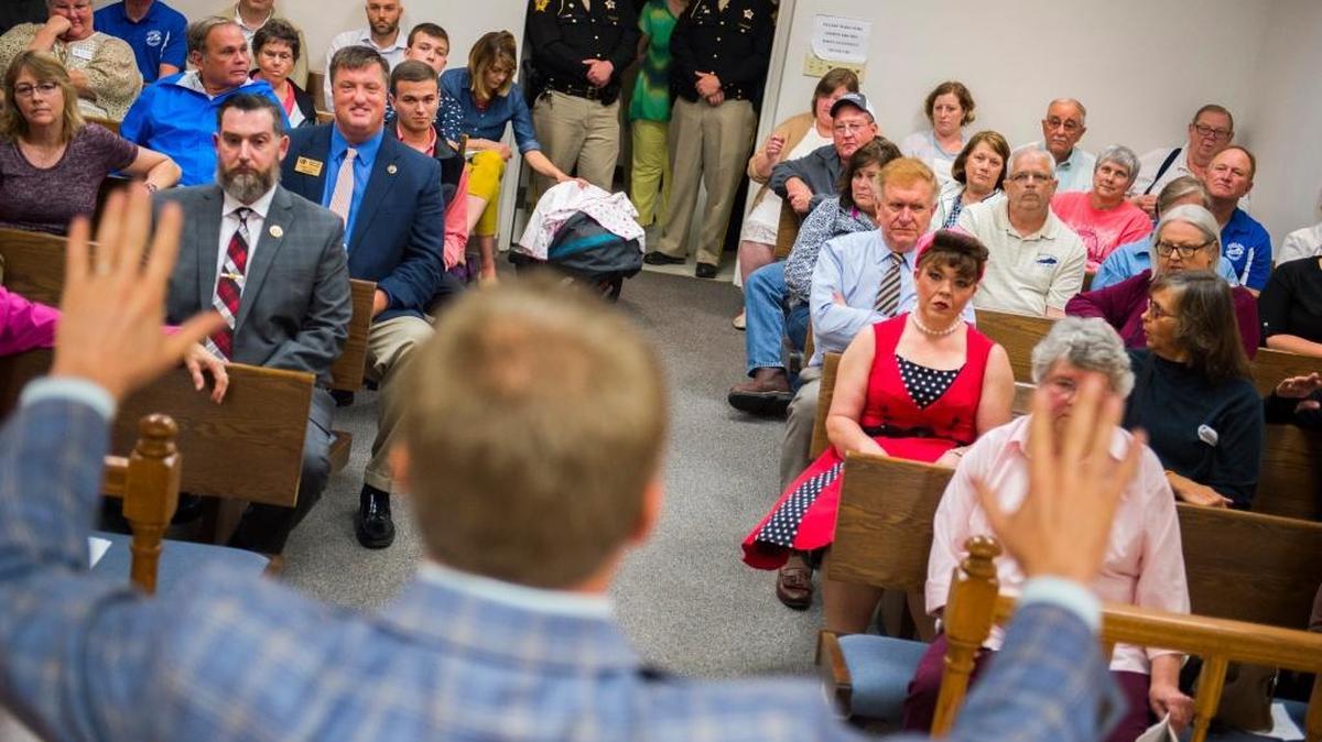 Rep. James Comer, R-Ky., calmed an argument between town hall attendees May 12 in Calhoun. Some people told him not to hold town halls, but Comer decided to face the possible hostility.