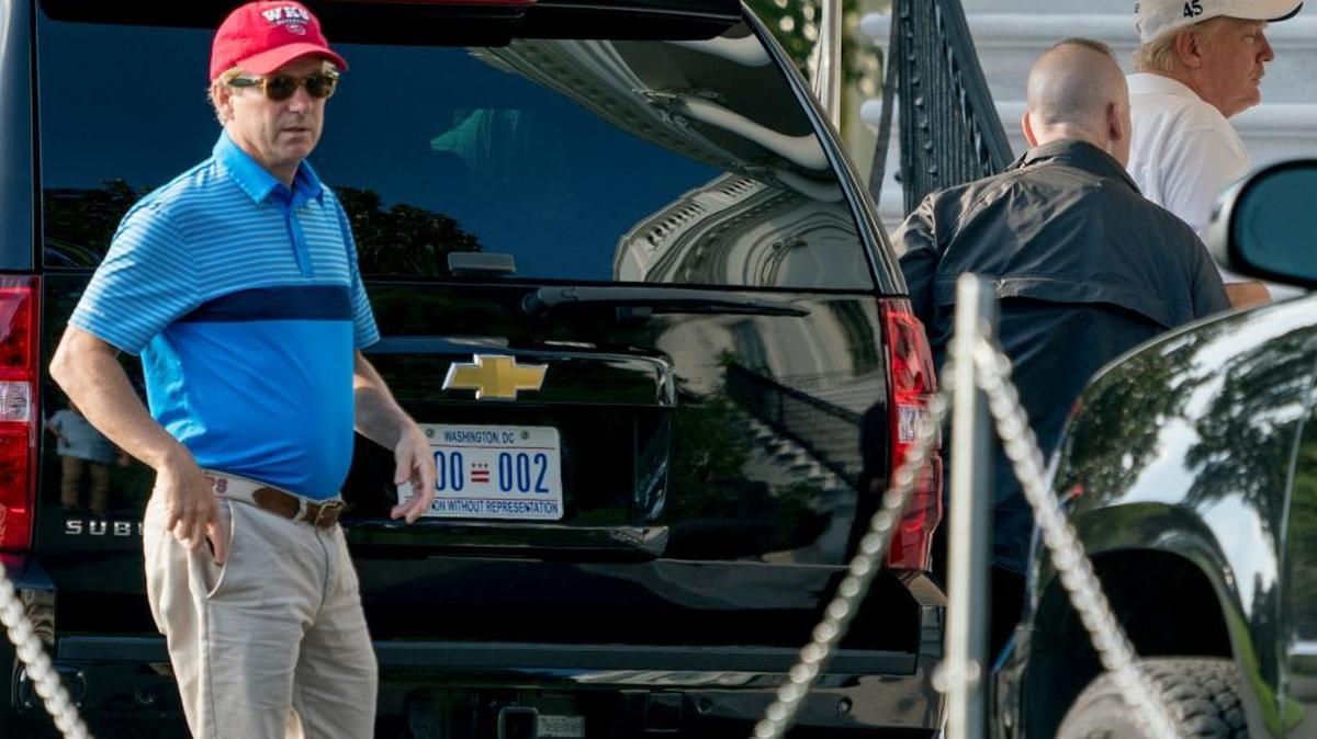 President Donald Trump right, and Sen. Rand Paul, R-Ky., left, arrive at the White House in Washington, Sunday, Oct. 15, 2017, after playing golf at Trump National Golf Club in Sterling, Va.