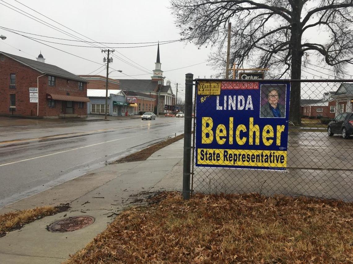 A campaign sign for Demcorat Linda Belcher hangs from a fence in Shepherdsville, Ky. on February 10, 2018. Belcher is running for State Representative against Rebecca Johnson, the wife of former lawmaker Dan Johnson who killed himself after being accused of molesting a teen.