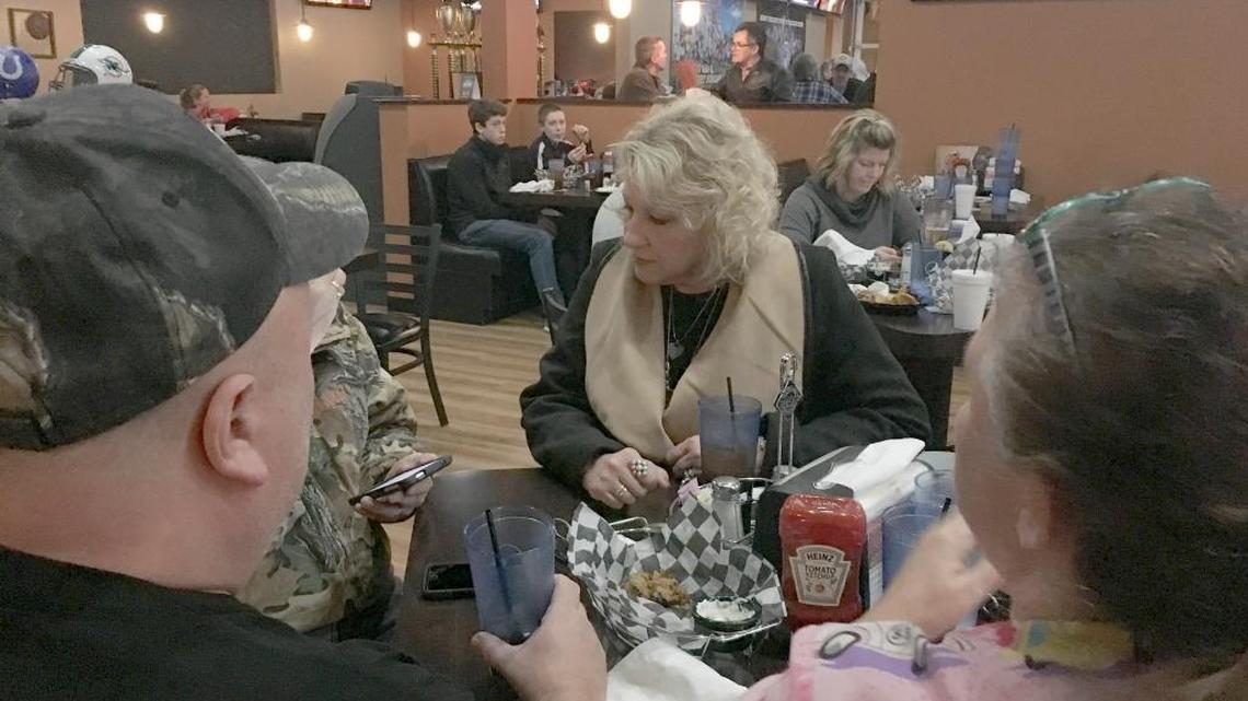 Rebecca Johnson talks to voters during a meet and greet event at Half-Time’s Bar and Grill in Mt. Washington, Ky. on Thursday Feb. 8, 2018. Johnson is running in a special election to fill the seat of her husband, who killed himself in December.