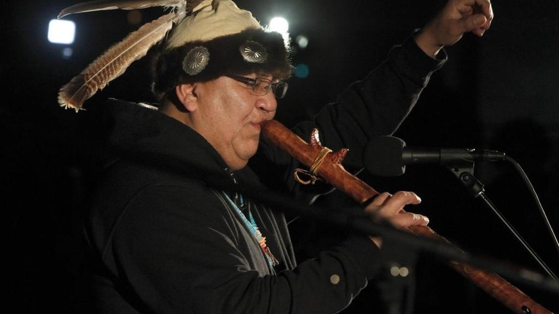 Fred Keems played the flute after speaking at the Lexington Dakota Access Pipeline rally.