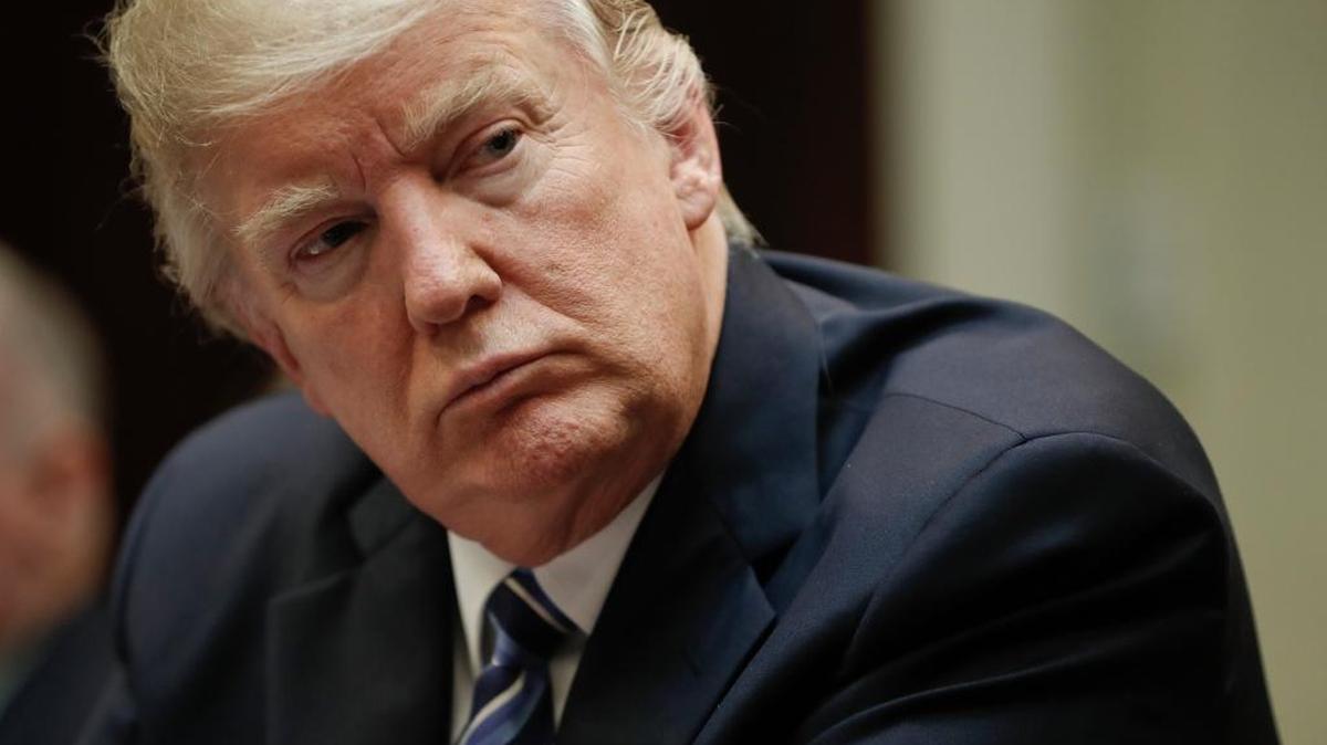 President Donald Trump listens during a meeting on healthcare in the Roosevelt Room of the White House in Washington, Monday, March 13, 2017.