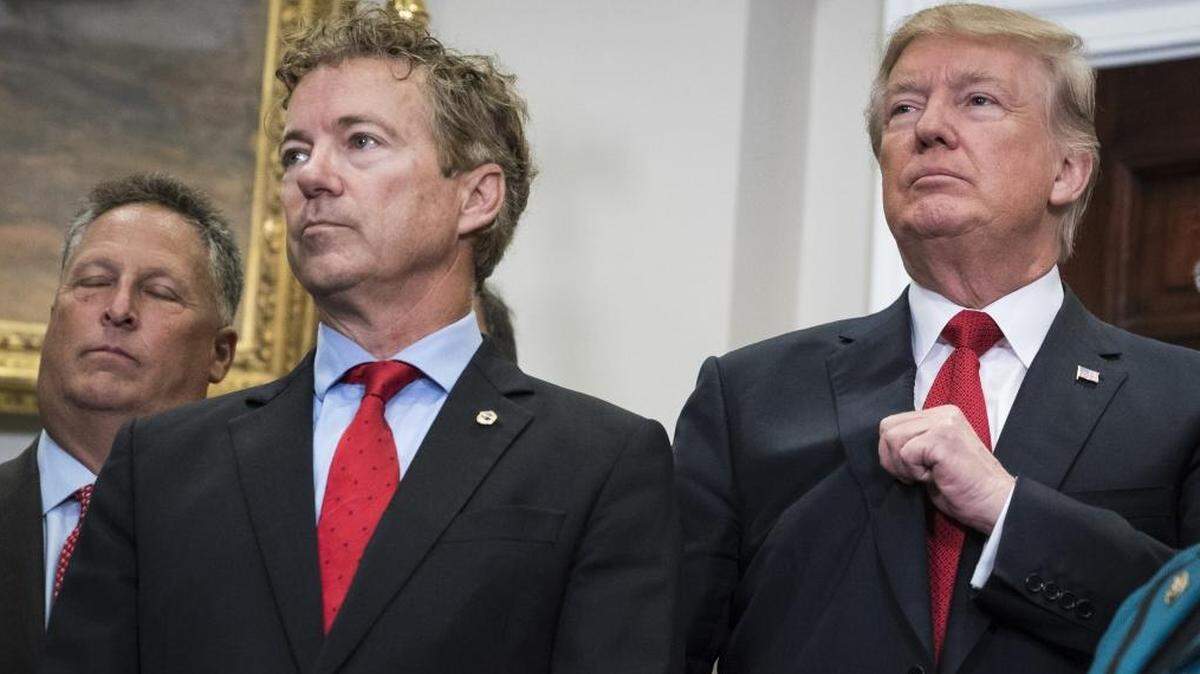 Sen. Rand Paul of Kentucky has become a proponent of President Donald Trump’s engagement with Russia. In this photo, Paul stood with Trump during the signing of an executive order in October 2017.
