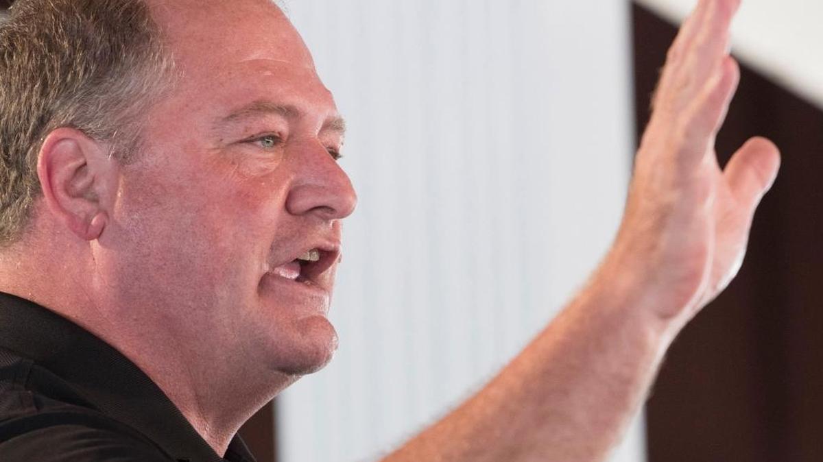 Kentucky House Speaker Jeff Hoover waved to the crowd during the political speeches at the Fancy Farm picnic on Aug. 5, 2017.