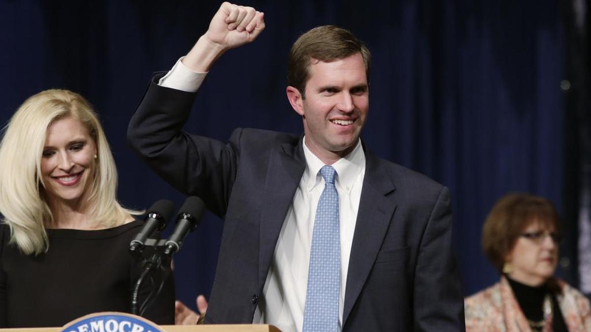 Andy Beshear with wife Britainy Beshear, left, spoke to supporters after being elected as Attorney General at Democratic election night headquarters at the Frankfort Convention Center in Frankfort, Ky., on Nov. 3, 2015.