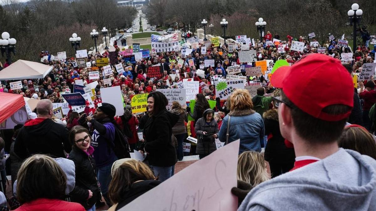 Teachers and other supporters fill the steps outside the Capitol before the start of a rally against SB 1 in Frankfort, Ky. on Monday, March 12, 2018.
