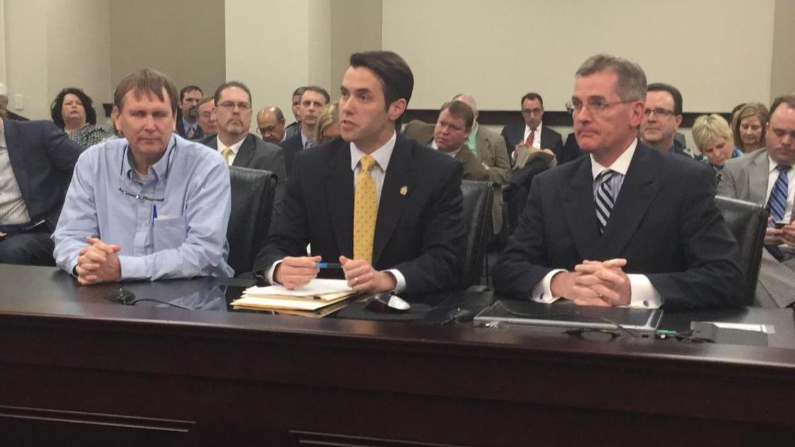 State Sen. Morgan McGarvey, center, testifies for bill for single-form marriage licenses with Floyd County Clerk Chris Waugh, left, and Kentucky County Clerks Association lobbyist Bill May.