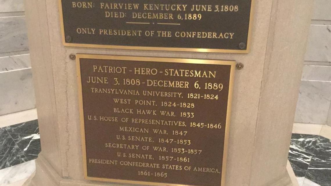 A controversial plaque on a statue of Jefferson Davis in the Kentucky Capitol Rotunda describes the president of the Confederacy as a “patriot-hero-statesman.”