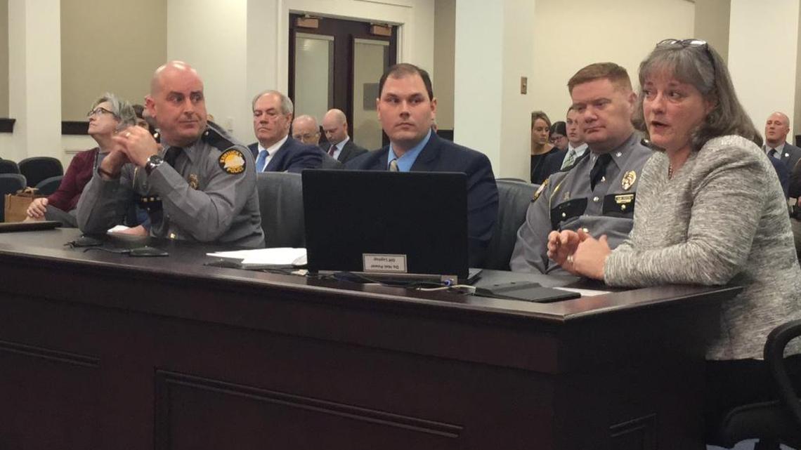Laura Sudkamp, assistant director of Kentucky State Police central laboratory, testified Tuesday, March 6, 2018, before the Senate budget committee about inadequate pay for KSP crime lab scientists. With her, from left to right, were KSP Captain Derek Grant, KSP forensic scientist Jamie Hibbard, and KSP Lieutenant Colonel Chad White.
