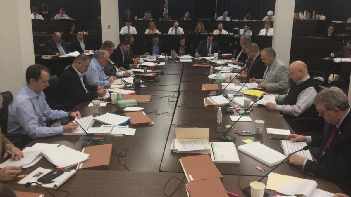 Leaders of the Kentucky House and Senate began negotiating a compromise state budget bill on Friday, March 23, 2018, in the Capitol Annex in Frankfort, Ky. The group is dominated by Republicans and includes only white men.