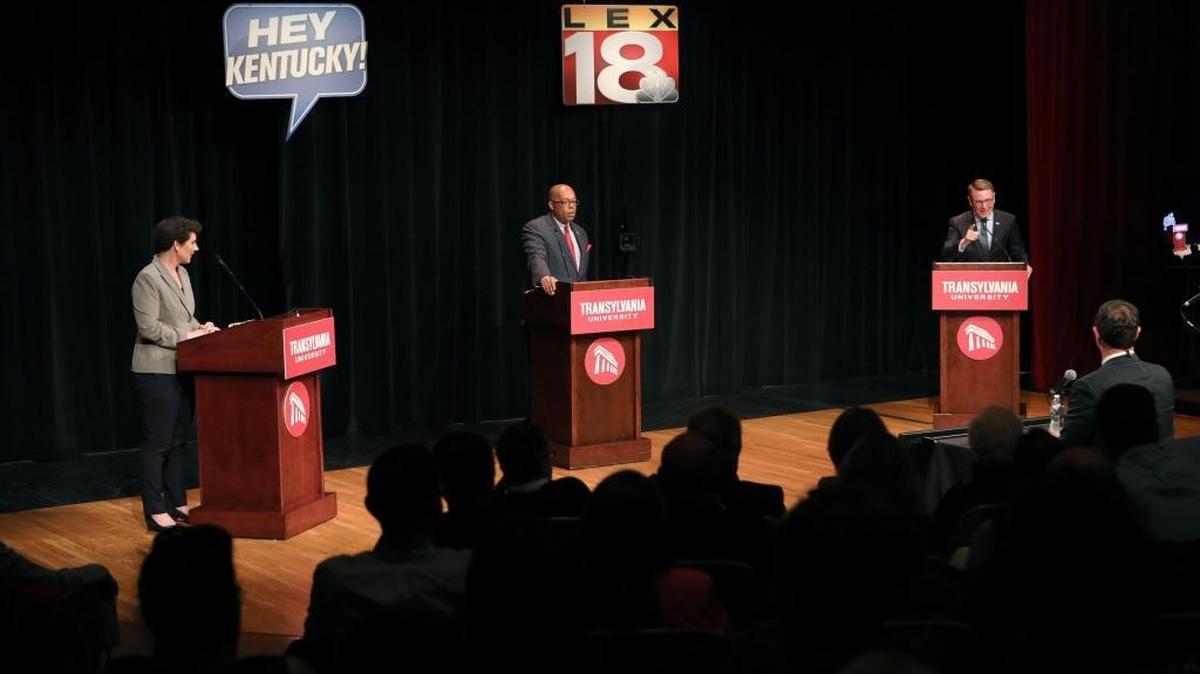 Democratic candidates for U. S. Congress Lt. Col. Amy McGrath, left, Sen. Reggie Thomas, D-Ky, and Lexington Mayor Jim Gray debated at Transylvania University on Wednesday.