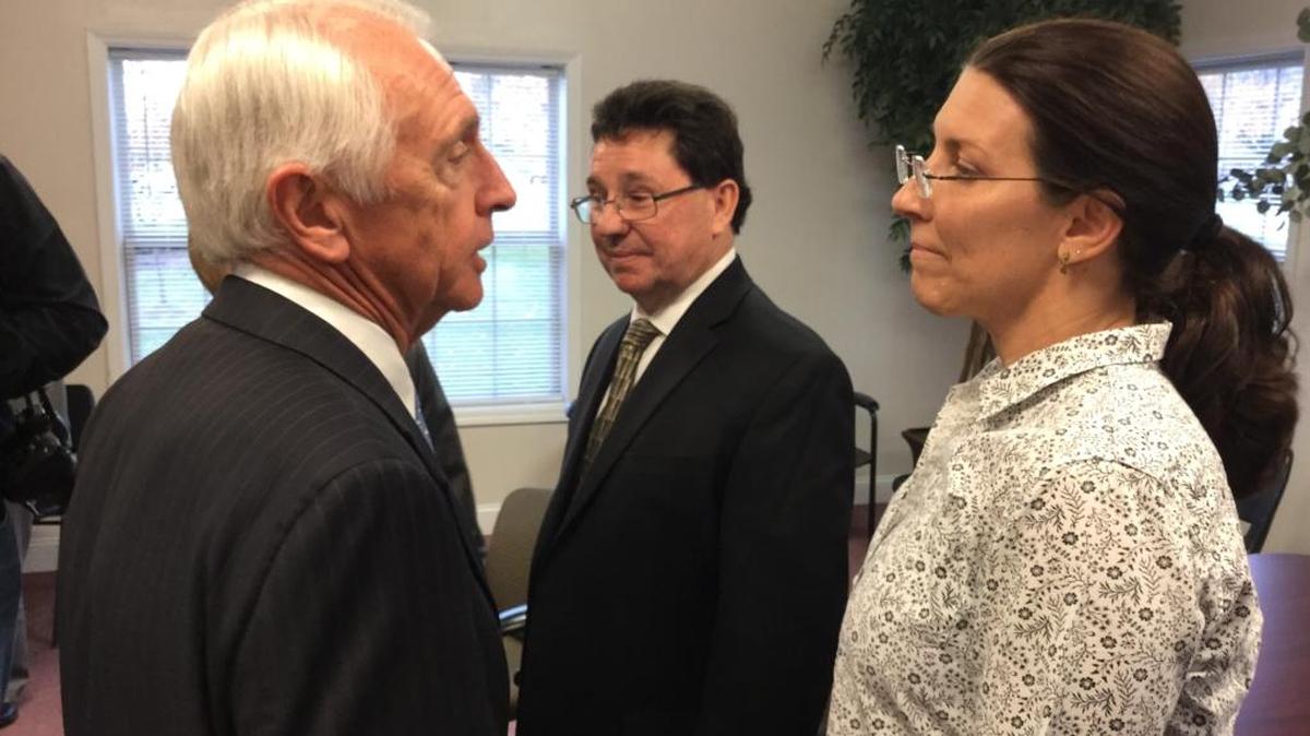 Gov. Steve Beshear congratulates Melissa Johnson on landing a job after graduating from Recovery Kentucky.