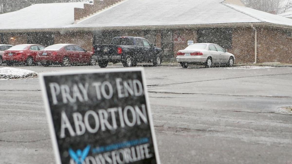 Sign across the street from the EMW Women's Clinic, 161 Burt Road in Lexington, Ky., Thursday, March 3, 2016.