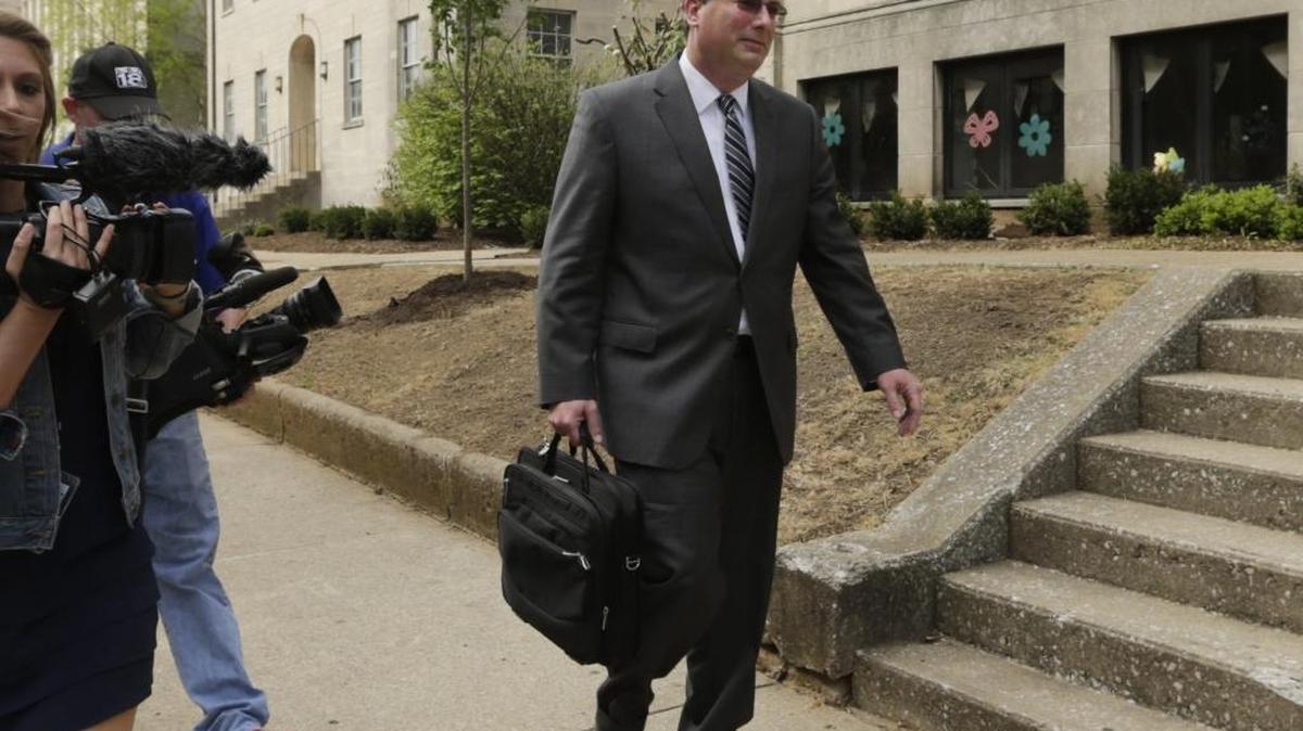 Timothy Longmeyer left the courthouse followed by press after pleading guilty to accepting kickbacks at the Federal Courthouse in Lexington, Ky, on April 19, 2016. Longmeyer, the former secretary of the Kentucky Personnel Cabinet, pled guilty to accepting kickbacks in exchange for securing contracts.