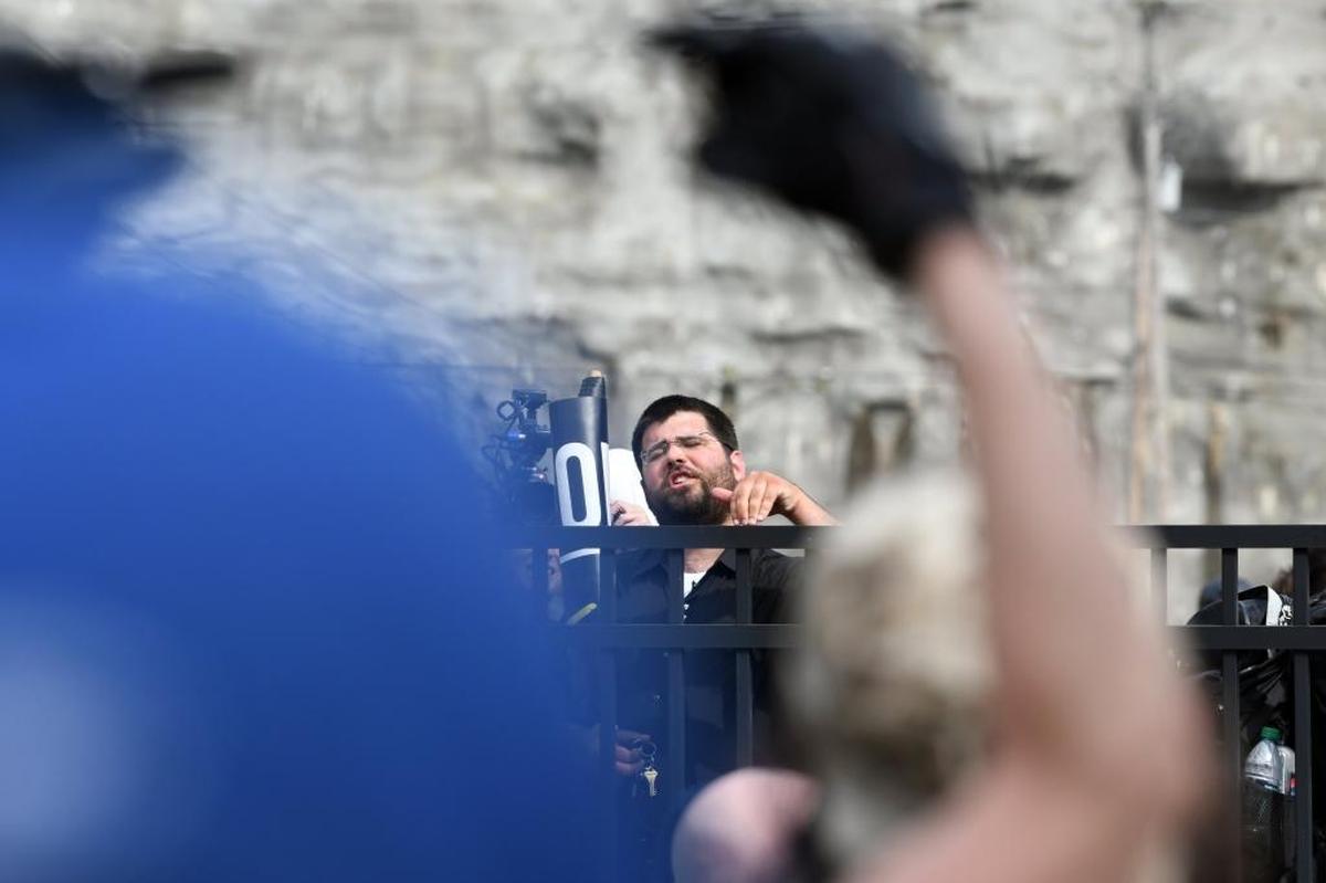 White supremacist Matthew Heimbach taunted counterprotesters on April 29 as he left a rally in Pikeville.