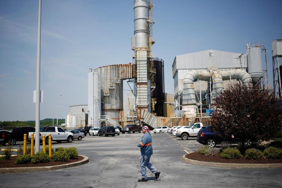 A plant employee walked through the parking lot outside Century Aluminum’s smelter in Hawesville, Kentucky. The company could locate a new smelter in Northeastern Kentucky, according to Gov. Andy Beshear’s announcement on Monday.