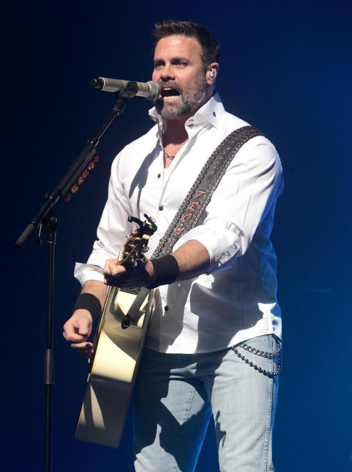 Troy Gentry of the country music duo Montgomery Gentry performed at the Rebels On The Run Tour in Lancaster, Pa., in 2013. Gentry, one half of the award-winning country music duo Montgomery Gentry, died in a helicopter crash Sept. 8.