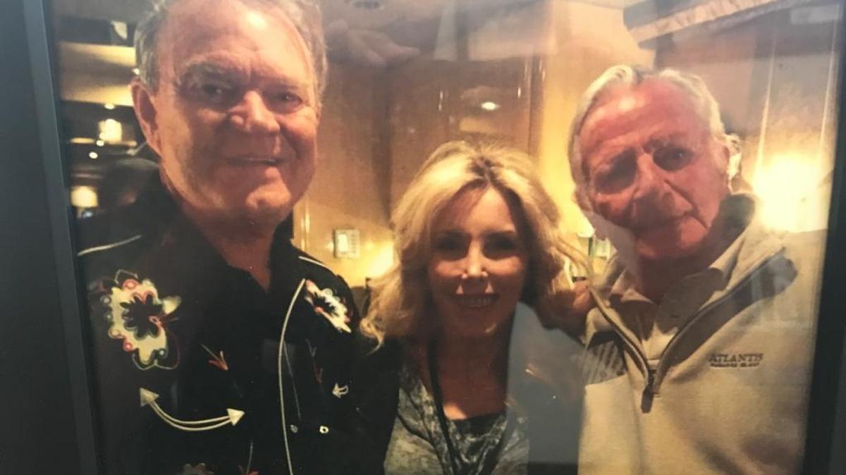 Glen Campbell, left, and his wife, Kimberly, with Hazard businessman L.D. Gorman in 2012 at the Lexington Opera House. Campbell played there that year.
