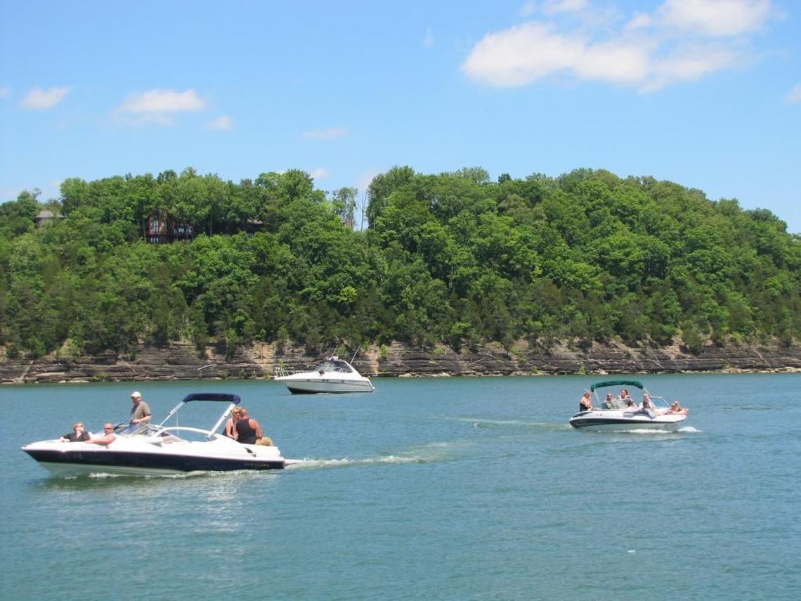 Boats cruised on Lake Cumberland near the Lake Cumberland state dock in May 2013.