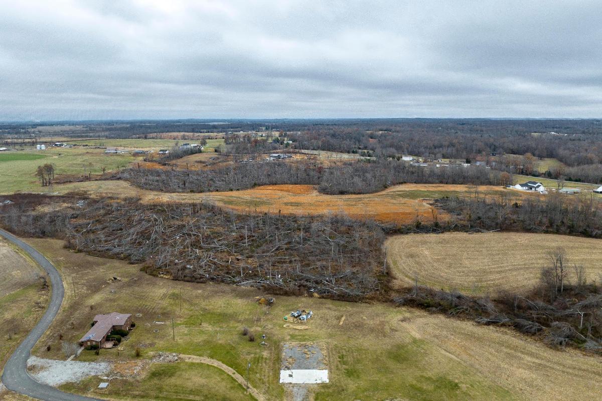 The path of a tornado that struck near Bremen, Ky., is still visible nearly a year after the tornado hit. Monday, Dec. 5, 2022.