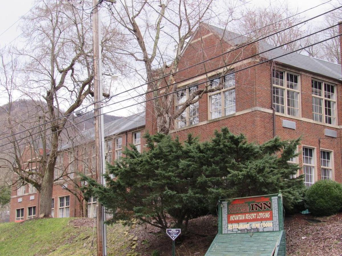 The Schoolhouse Inn in Benham, in Harlan County, is in the building that served as the town’s high school for decades beginning in the 1920s. Classrooms were converted to lodging.