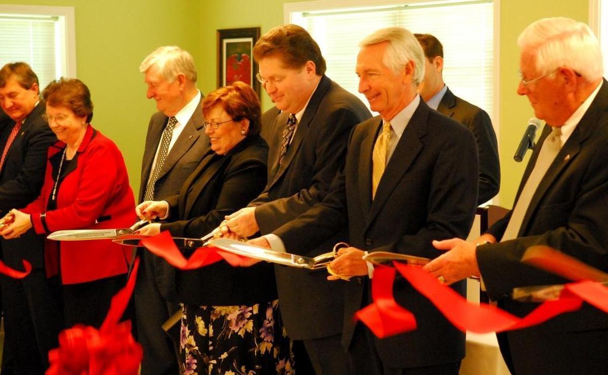 A ceremonial ribbon cutting in 2008 marked the opening of the Hope Center’s George Privett Recovery Center. From left, Luther Deaton of Central Bank, Myra and Don Ball of Ball Homes, Bonnie Quantrell, Hope Center Chair Randy Breeding, Gov. Steve Beshear and Cecil Dunn, the Hope Center’s executive director.