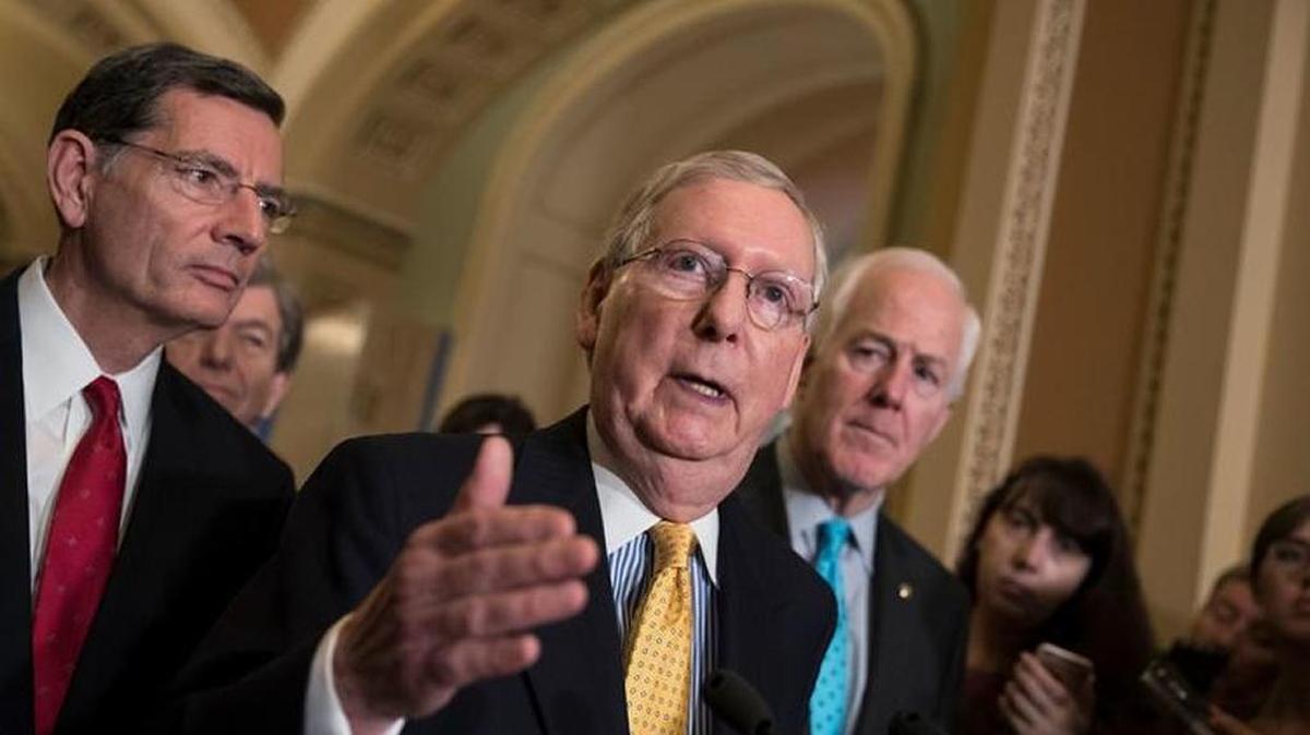 Senate Majority Leader Mitch McConnell, flanked by Sen. John Barrasso, R-Wyo., left and Majority Whip John Cornyn, R-Texas, moved last week to fast track a Republican bill replacing the Affordable Care Act.