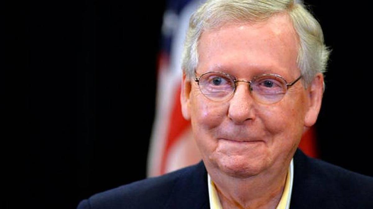 Senate Majority Leader Mitch McConnell of Kentucky reacts to a reporter’s question during a news conference Saturday, Dec. 2, in Louisville. The Senate had passed the tax bill early that morning on a 51-49 vote.