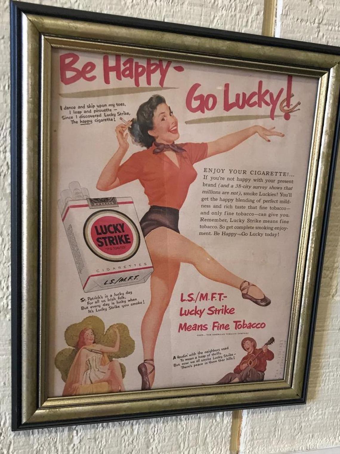 Cigarette advertising from a bygone era decorates the office at Farmers Tobacco Warehouse in Danville.