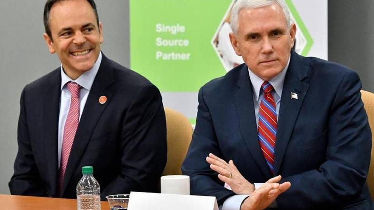Vice President Mike Pence, right, and Gov. Matt Bevin addressed a group of business owners in Louisville in March.