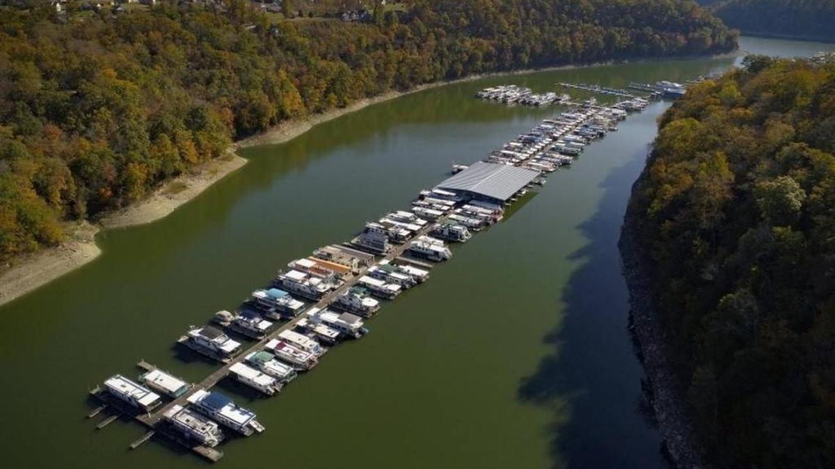Dozens of houseboats docked at Lee’s Ford Resort Marina in Nancy on Oct. 31. The state property tax rate on houseboats is 1.5 cents per $100 value, while the rate on small boats is 45 cents per $100.