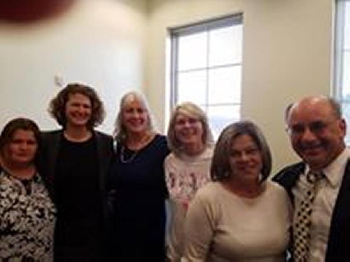 Four women who worked at the Little Sandy Correctional Complex accepted a $1.5 million settlement in a sexual harassment lawsuit. From left, they are Donna Adkins; one of their lawyers, Bethany Baxter; Lisa Suliman; Colleen Peyton; Jennifer Dennis; attorney Ned Pillersdorf.