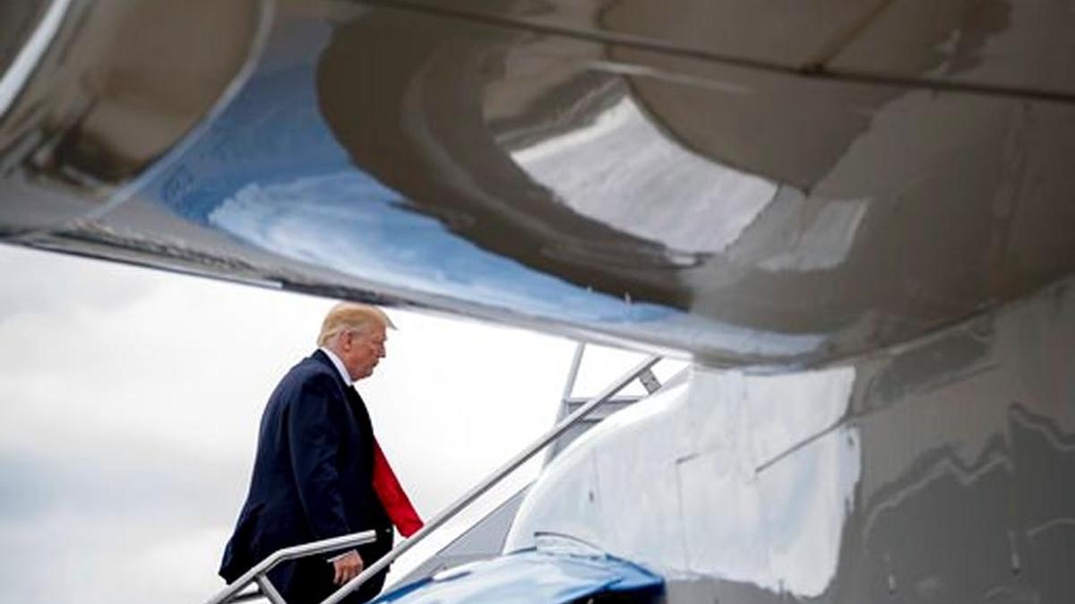 President Donald Trump boards Air Force One at Cincinnati Municipal Lunken Airport Wednesday after speaking about health care and infrastructure.