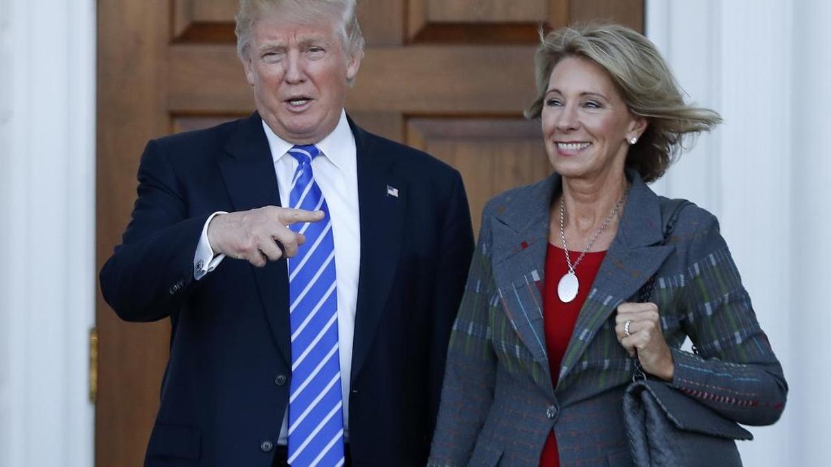 President Donald Trump and Education Secretary Betsy DeVos.