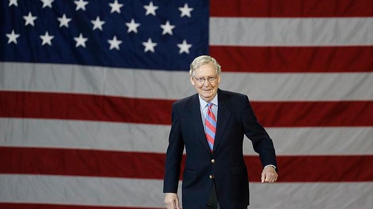 Senate Majority Leader Mitch McConnell arrives to introduce President Donald Trump during Monday’s rally at Freedom Hall in Louisville.