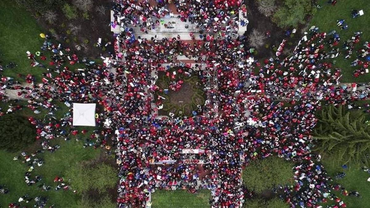 Thousands of teachers gather during a rally for education funding Monday at the state Capitol in Frankfort.