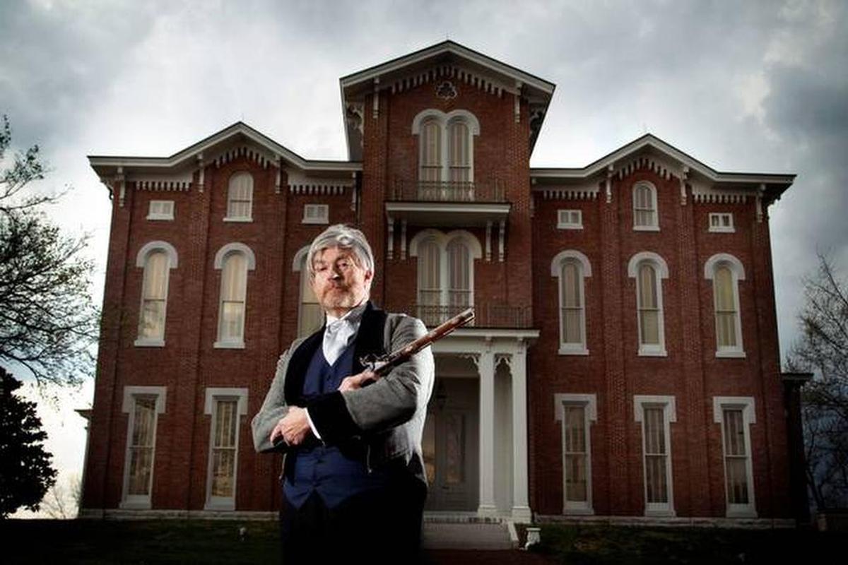 An actor portraying the colorful anti-slavery crusader Cassius M. Clay for a 2011 film, stood in front of Clay’s mansion, now the White Hall State Historic Site in Madison County.
