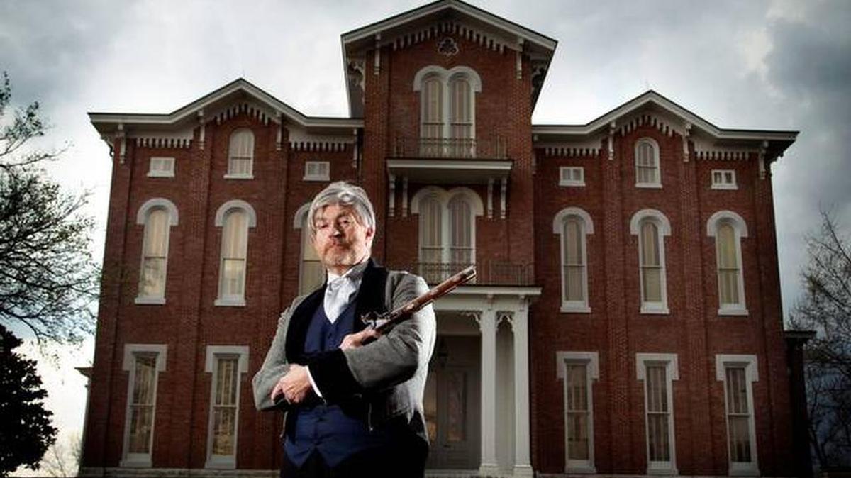 An actor portraying the colorful anti-slavery crusader Cassius M. Clay for a 2011 film, stood in front of Clay’s mansion, now the White Hall State Historic Site in Madison County.