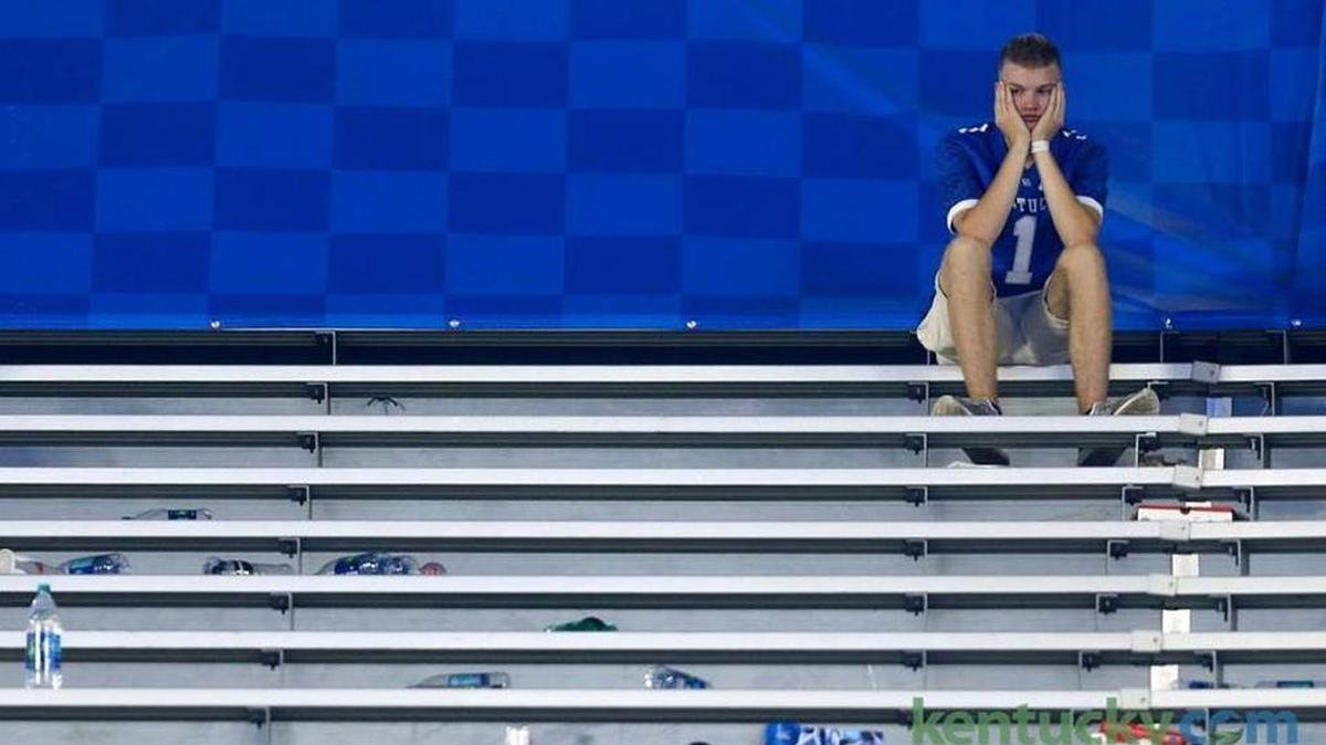 A dejected Kentucky fan sat in the stands after UK’s 28-27 come-from-ahead loss to Florida last season at Kroger Field. It was Florida’s 31st straight football victory over Kentucky.