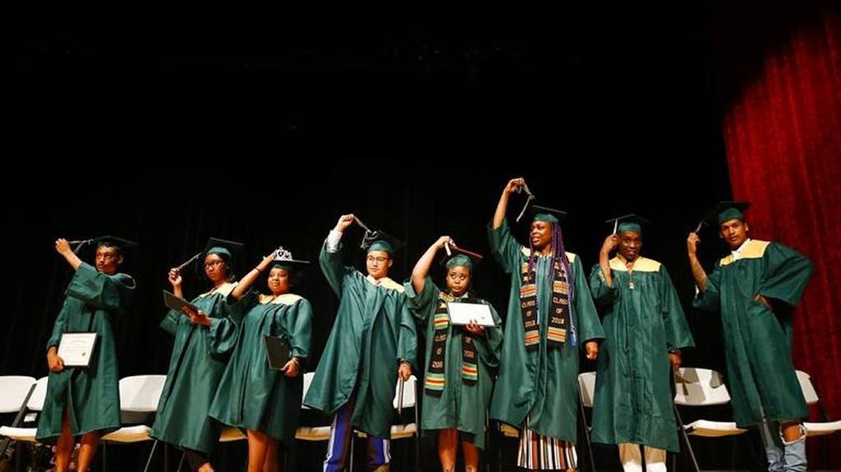 Bryan Station High School graduates participated in the All Grads Walk ceremony at the Lyric Theatre after 15 students had been turned away from the June 1 ceremony because they were late or had not met the dress code.