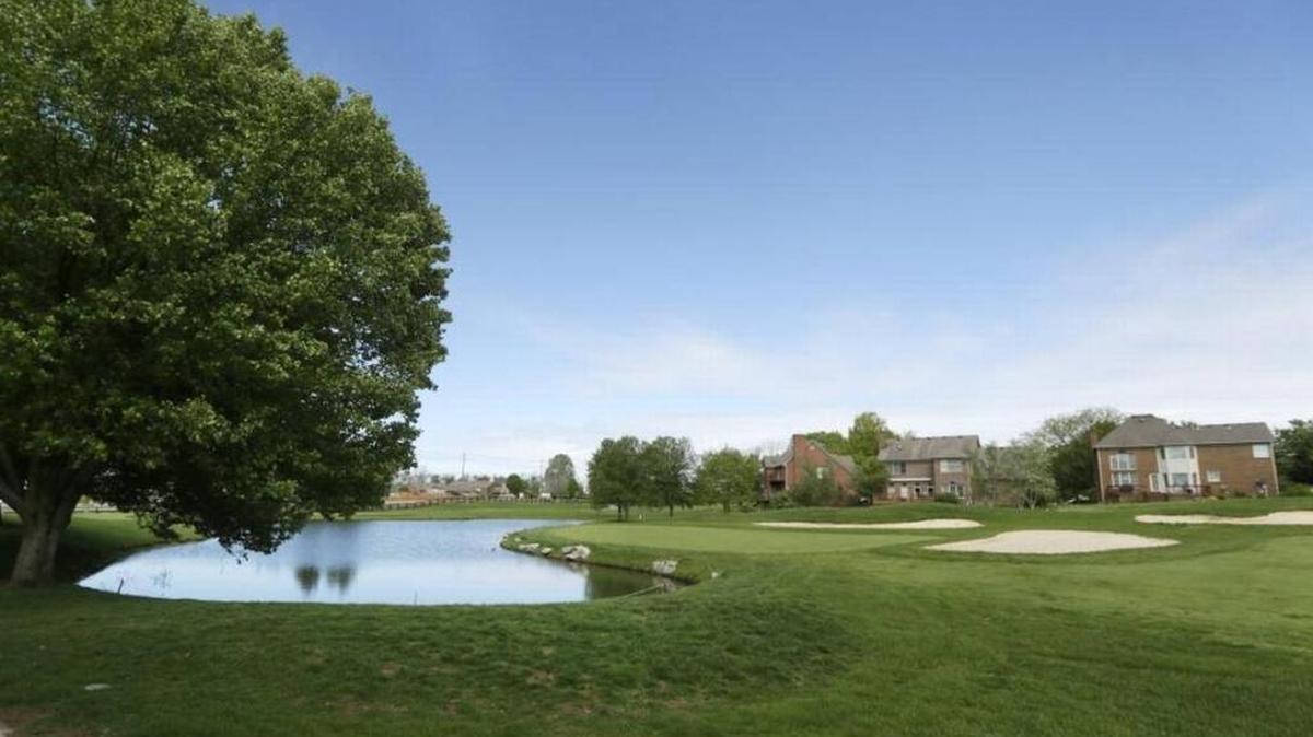 Houses near the ninth green at Andover Golf and Country Club in Lexington. The golf course, which closed in February, was sold in April for $2.95 million to its mortgage holder, Whitaker Bank.