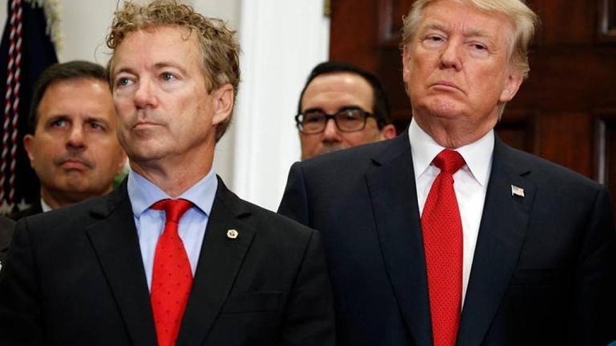 President Donald Trump stood with Sen. Rand Paul, R-Ky., during an event to sign an executive order on health care in the Roosevelt Room of the White House Oct.19.