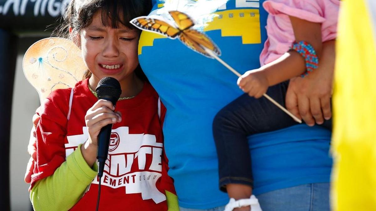 Akemi Vargas, 8, cries as she talks about being separated from her father during an immigration family separation protest in front of the Sandra Day O’Connor U.S. District Court building, Monday, June 18, 2018, in Phoenix. An unapologetic President Donald Trump defended his administration’s border-protection policies Monday in the face of rising national outrage over the forced separation of migrant children from their parents. (AP Photo/Ross D. Franklin)