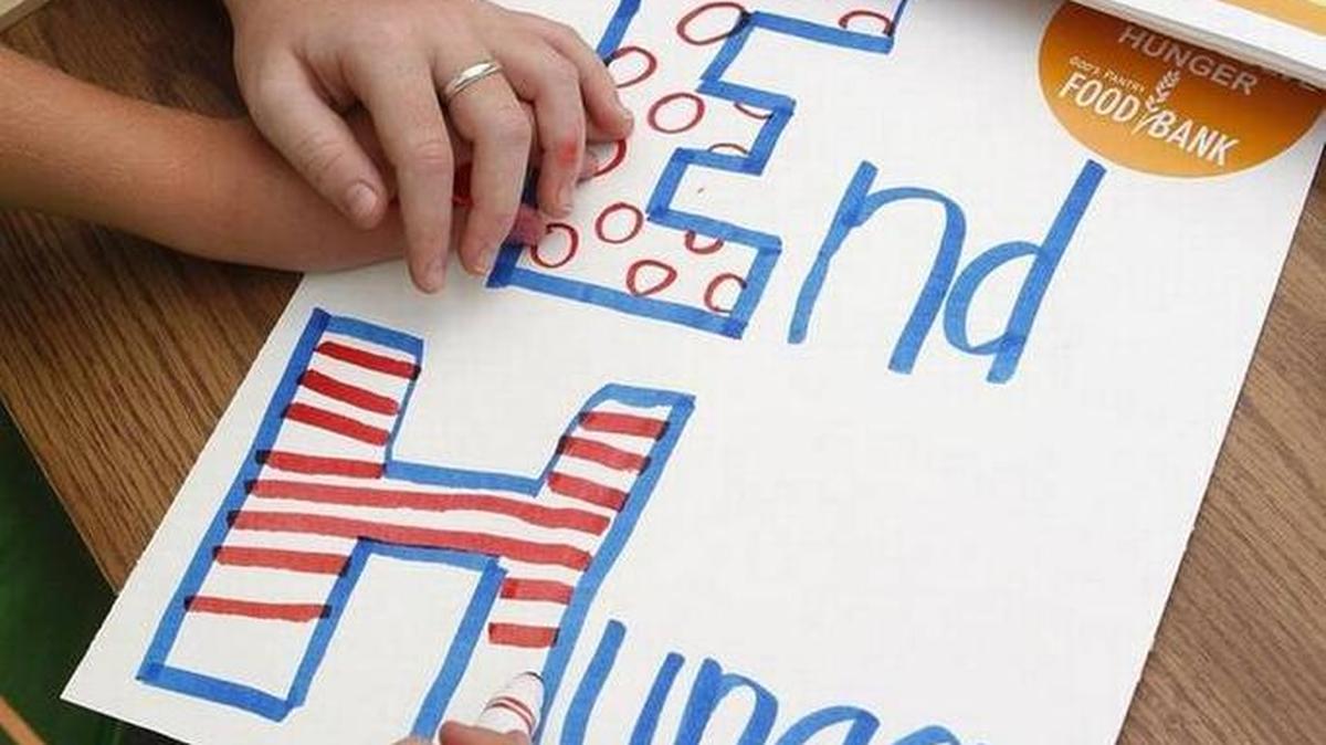 Children decorated posters to carry during the 2016 Greater Lexington CROP Hunger Walk.